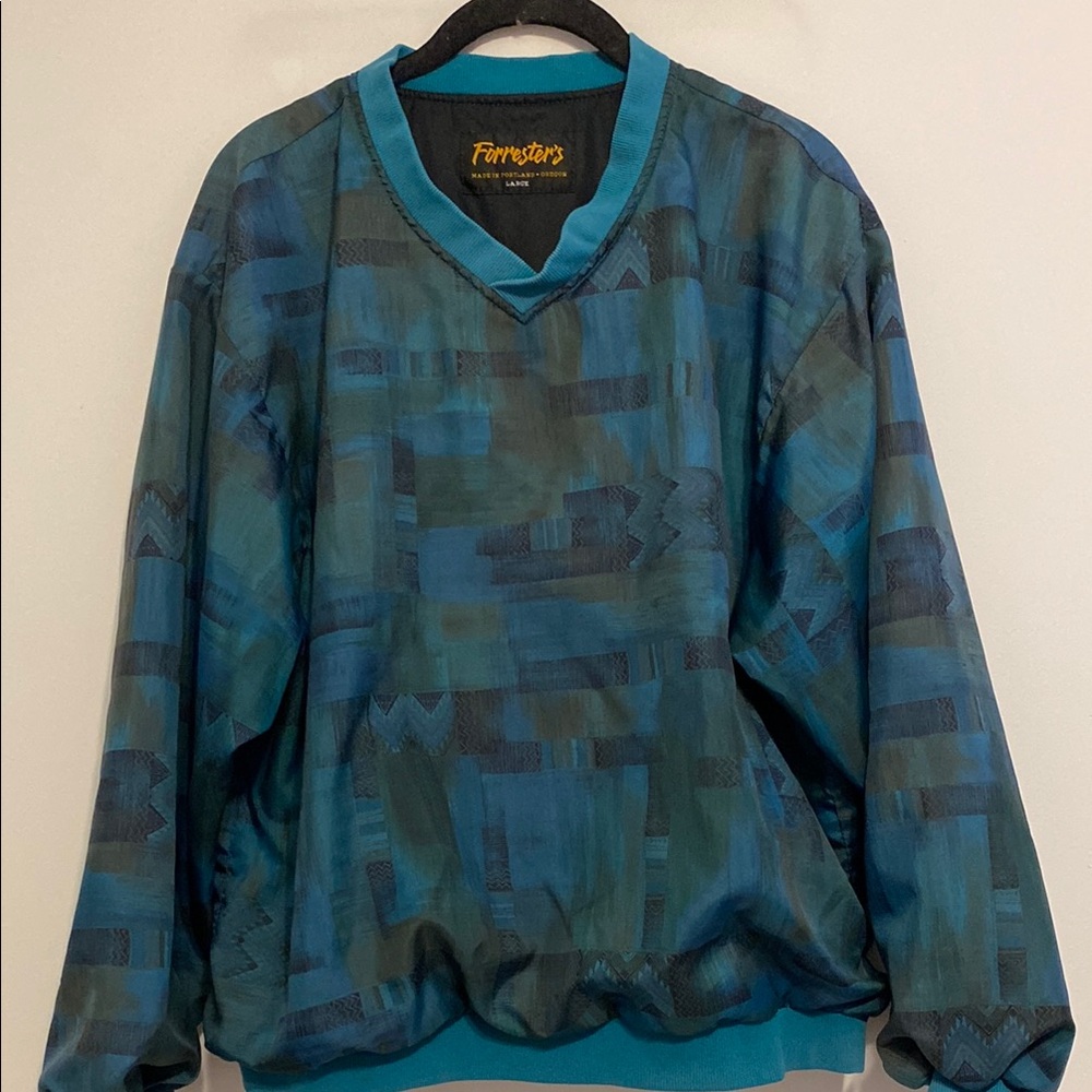 Womens active top,  extra warmth outside .  100 polyester.  Blues and greens